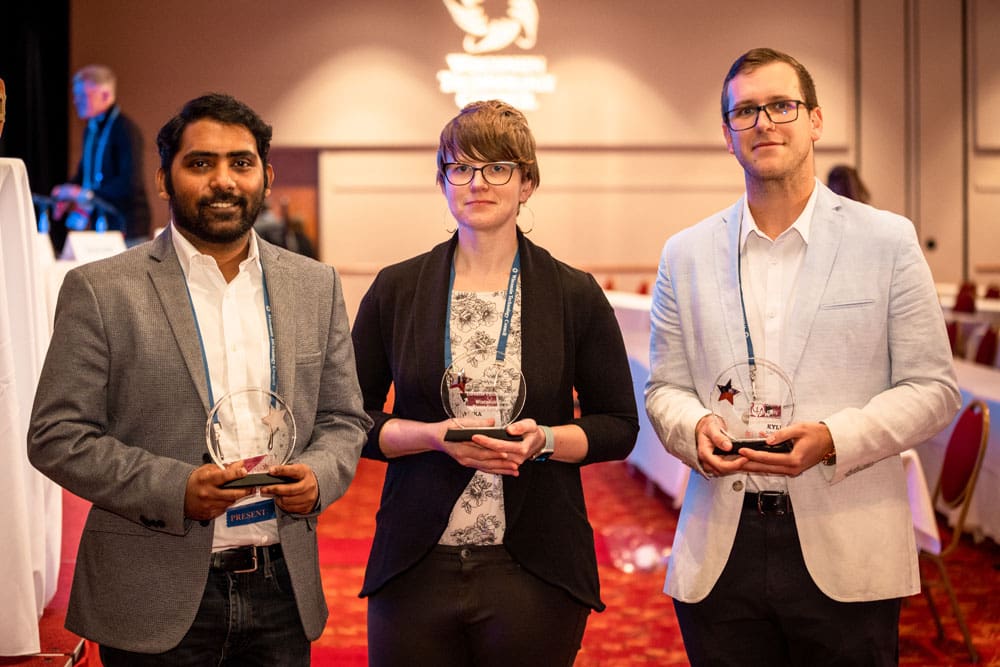Elevator Pitch Olympics winners from L-R: Aishwarya Das Praveen, Dirac Labs; Erika Poole, Spectacle Health; and Kyle Schneider, Sygmatic